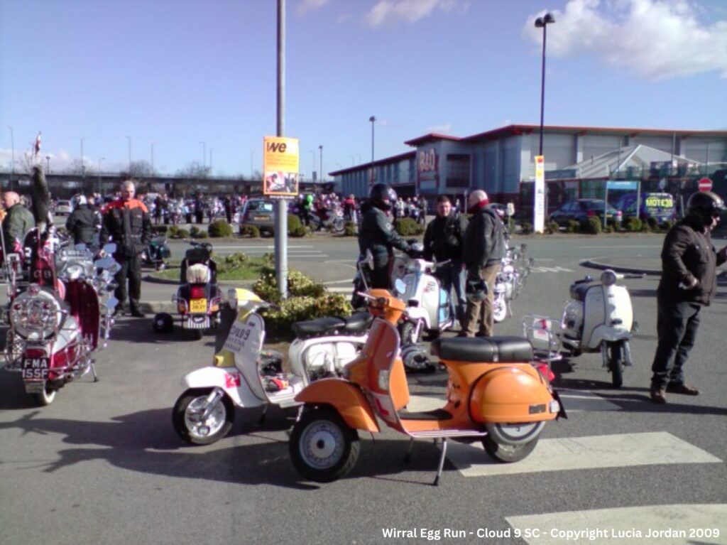 Cloud 9 scooter club Birkenhead at Bidston B&Q meeting up before the official Wirral Egg Run 2009